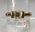 14k .25ct emerald cut diamond and ruby ring