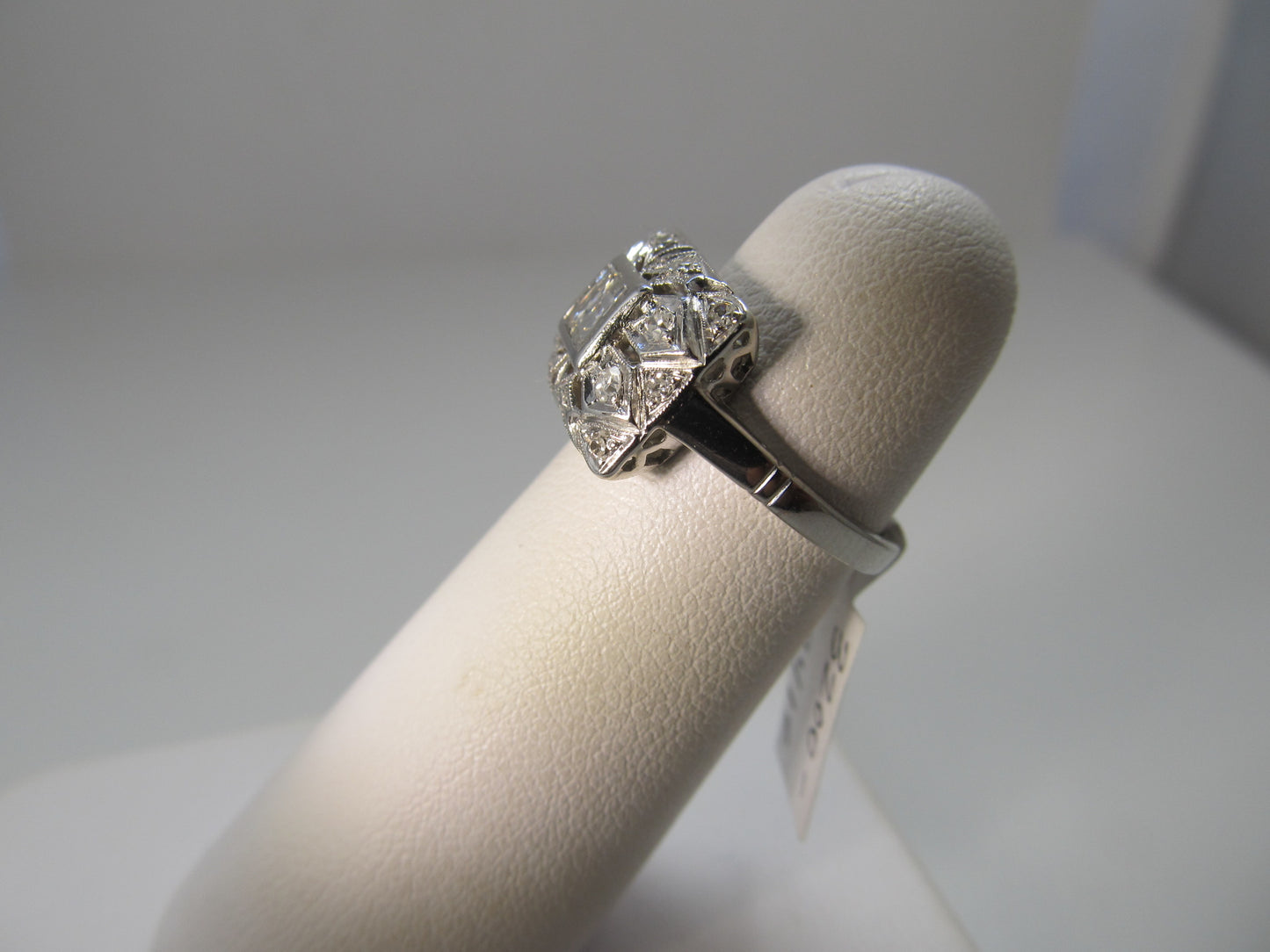 Antique platinum .55ct diamond ring