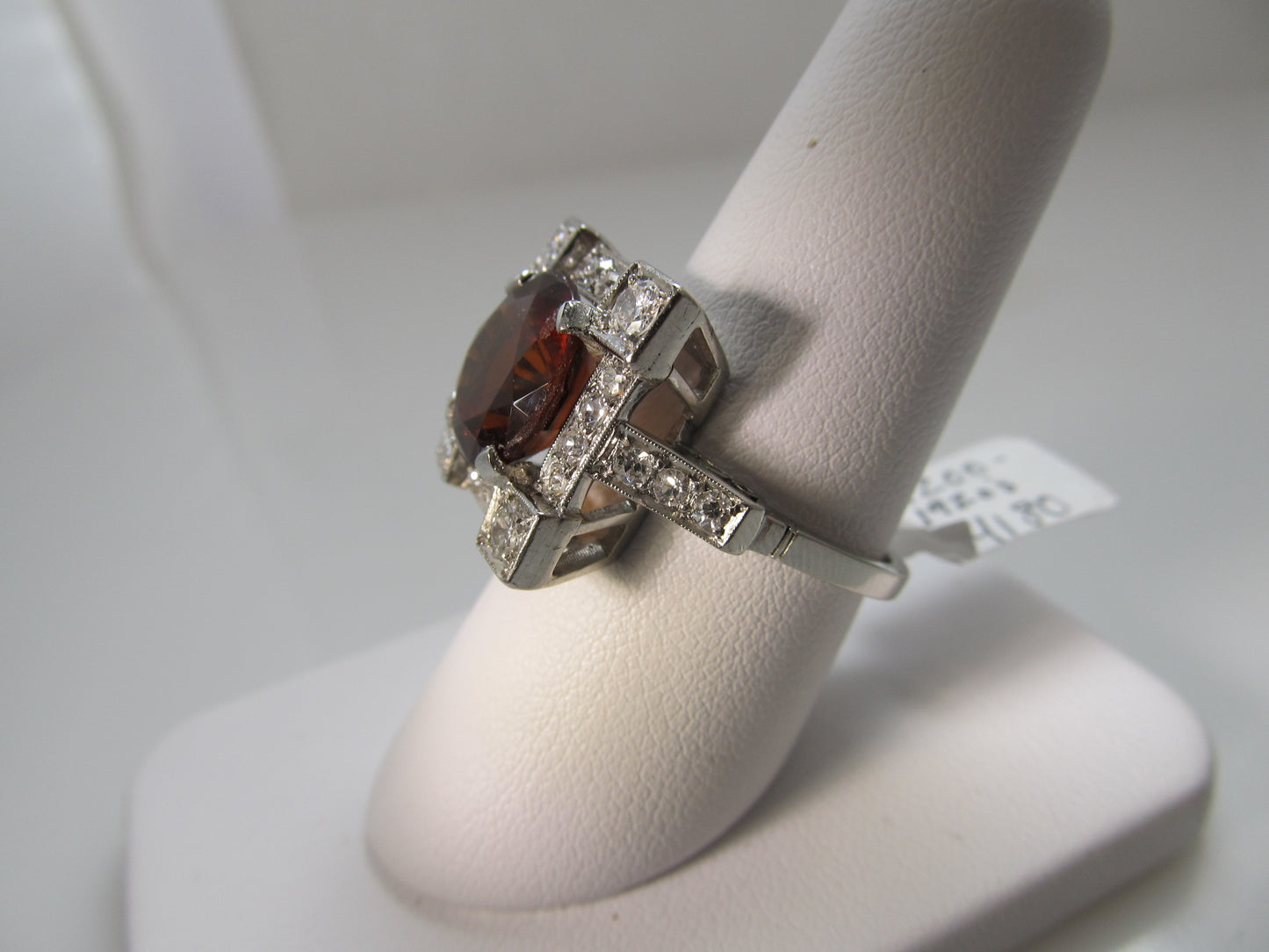 Huge antique platinum ring with a garnet and diamonds