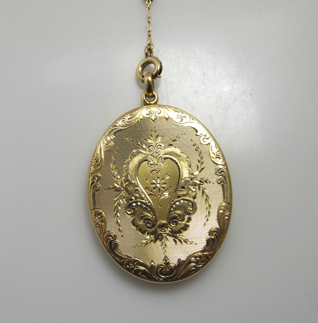 Antique hand engraved 14k yellow gold locket necklace