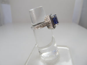 2.75ct tanzanite and diamond halo ring