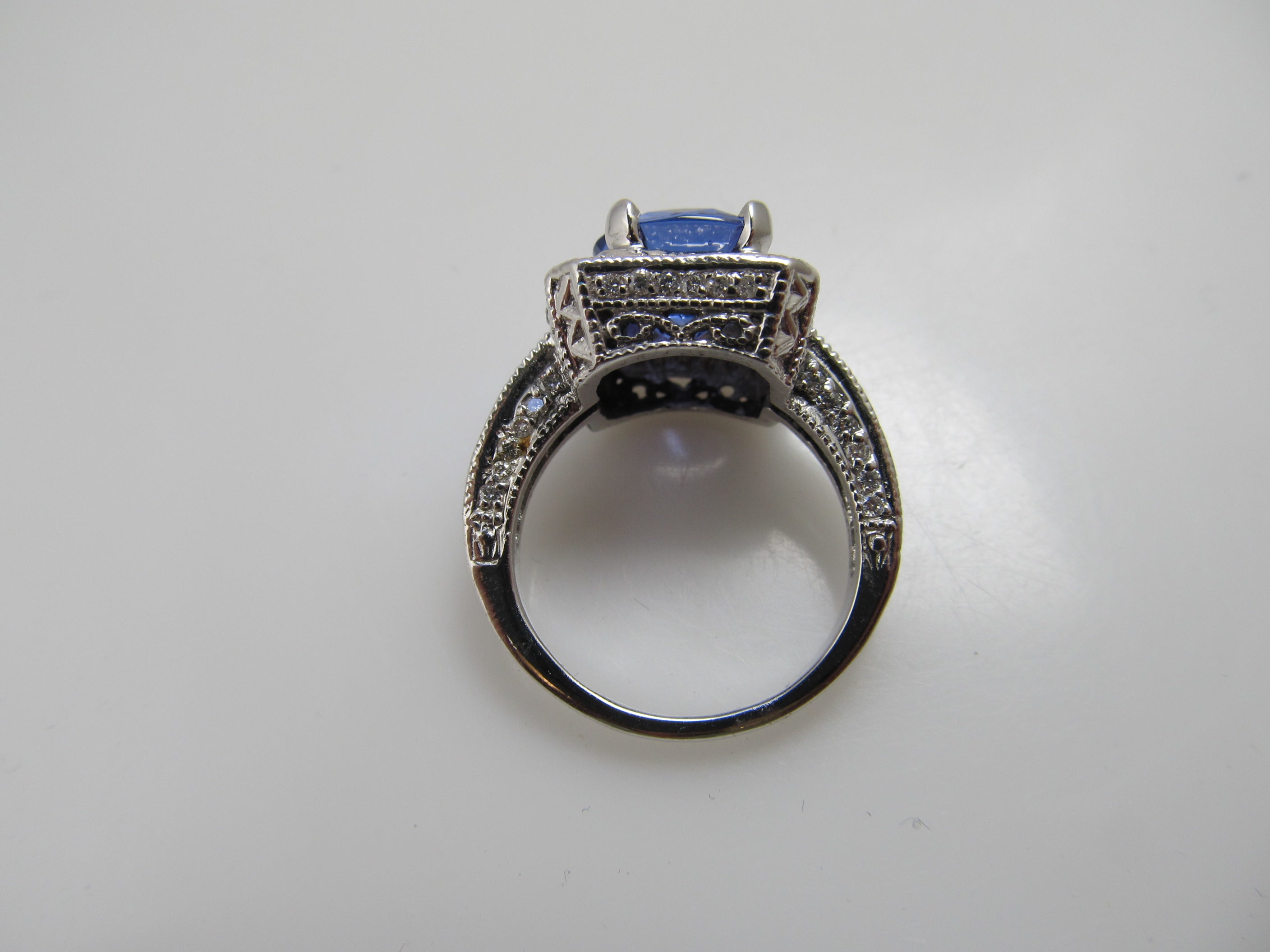 2.75ct tanzanite and diamond halo ring