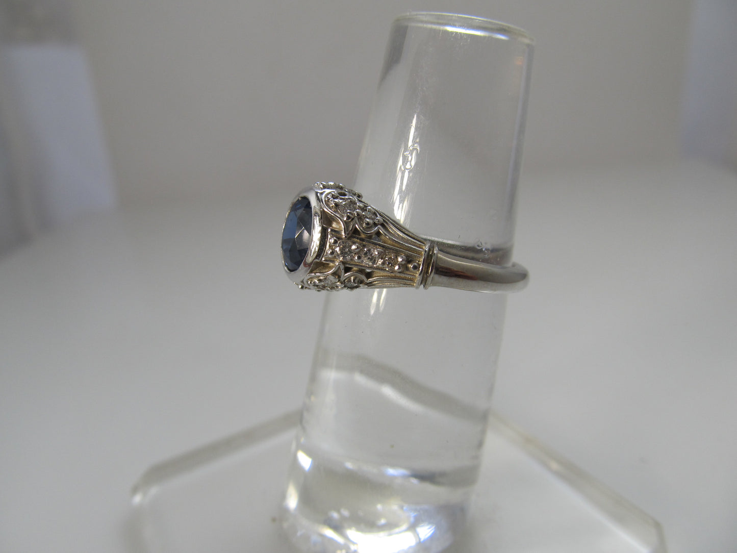 Filigree ring with a sapphire and diamonds