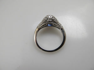 Filigree ring with a sapphire and diamonds