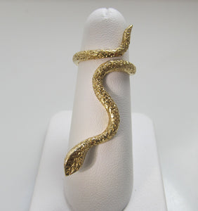 Neat vintage long snake ring with sapphire eyes