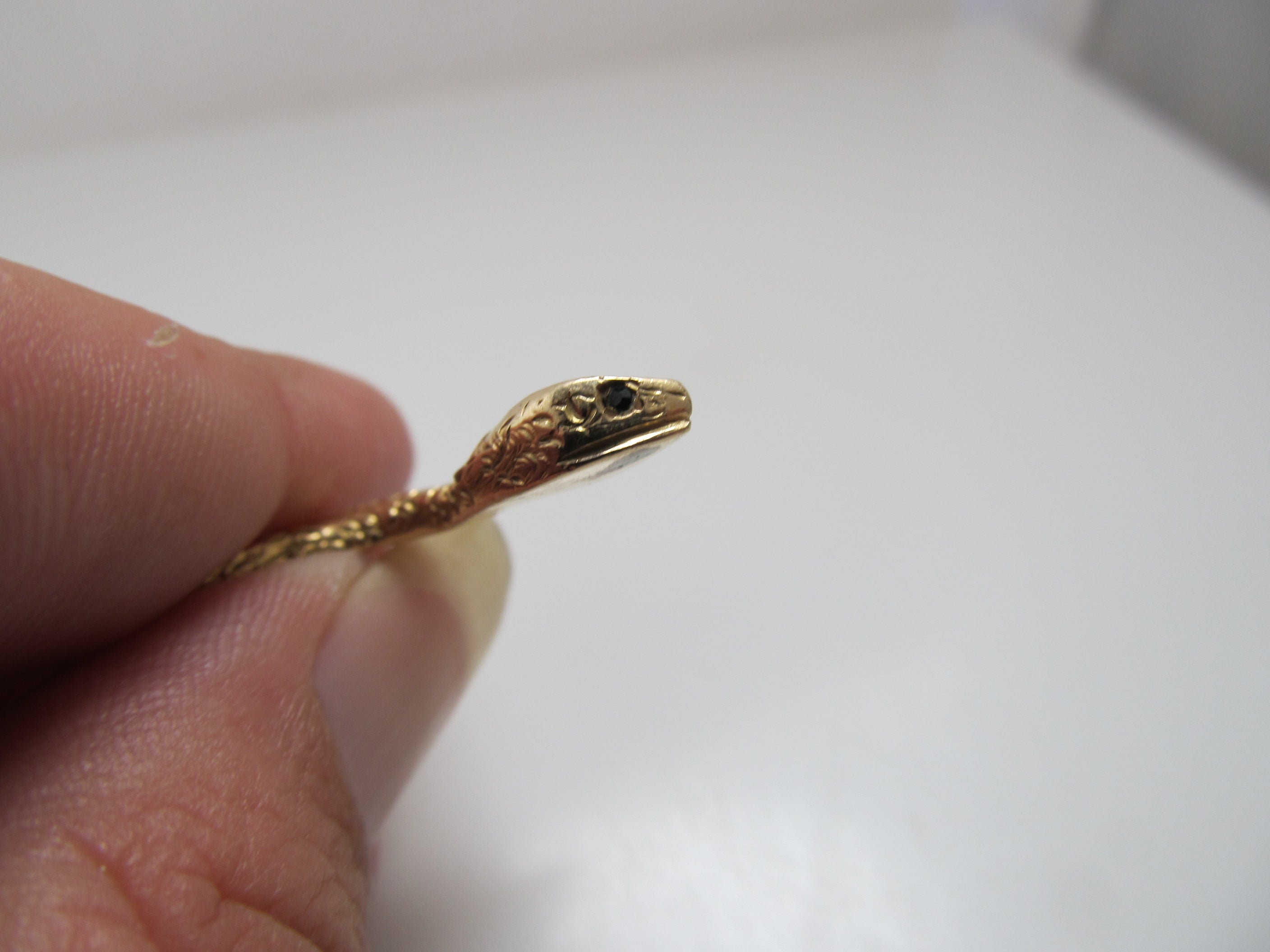 Neat vintage long snake ring with sapphire eyes