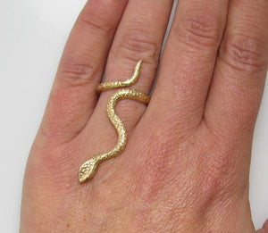 Neat vintage long snake ring with sapphire eyes