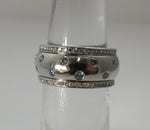Platinum eternity band with light blue and white diamonds