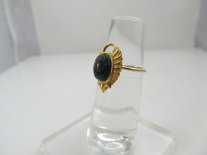 Egyptian revival conversion ring with a bloodstone scarab, circa 1920.