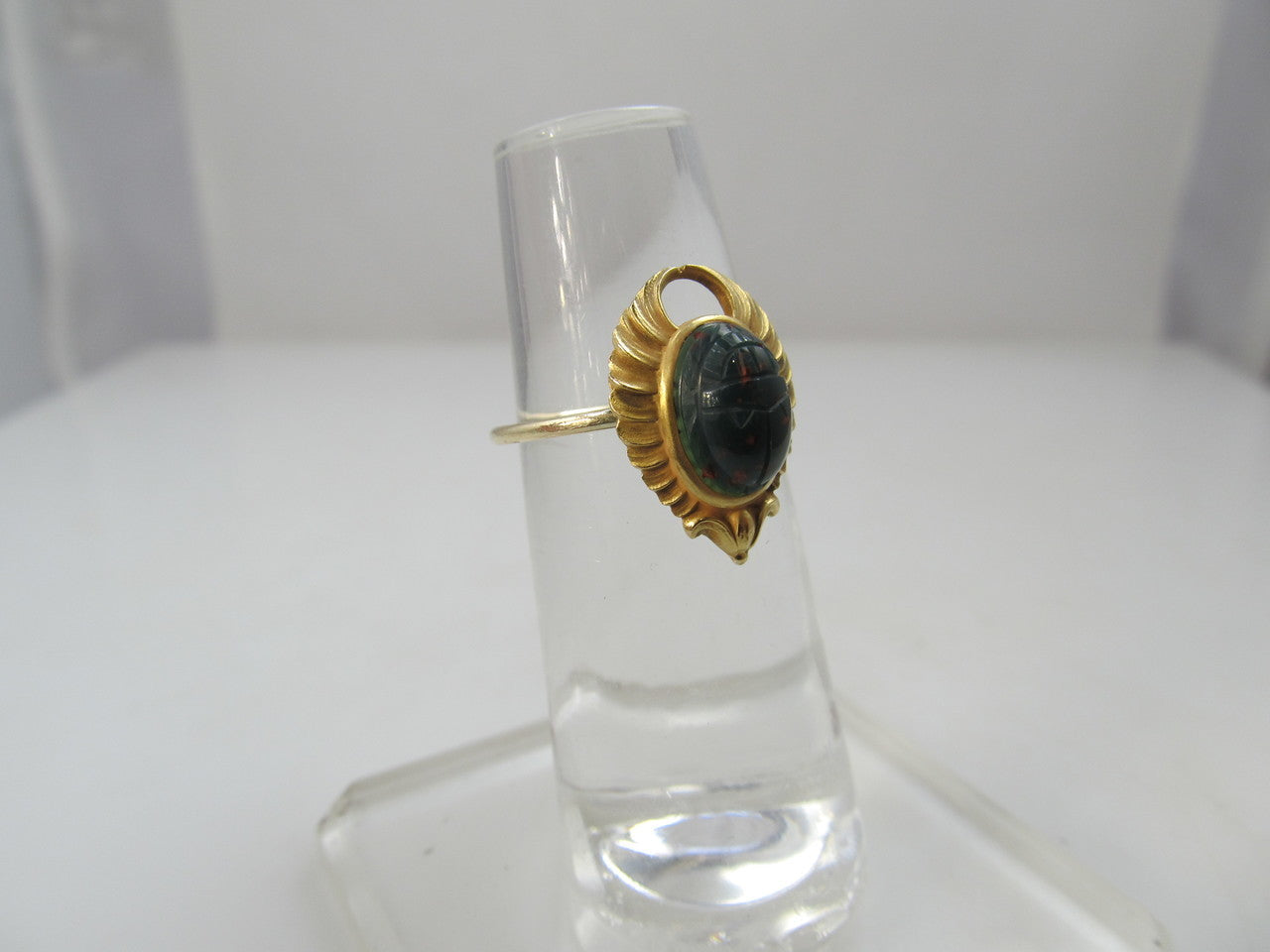 Egyptian revival conversion ring with a bloodstone scarab, circa 1920.