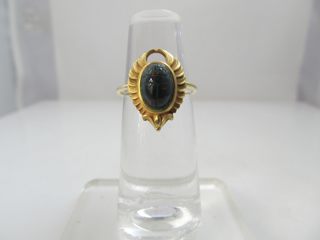 Egyptian revival conversion ring with a bloodstone scarab, circa 1920.