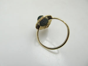 Egyptian revival conversion ring with a bloodstone scarab, circa 1920.