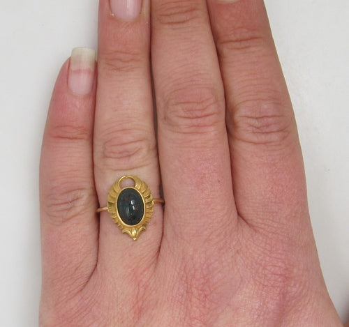 Egyptian revival conversion ring with a bloodstone scarab, circa 1920.