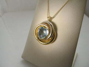 Heart shaped aquamarine necklace in 14k gold