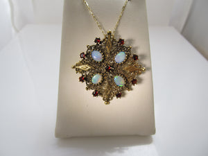 Vintage gold necklace with opals and garnets