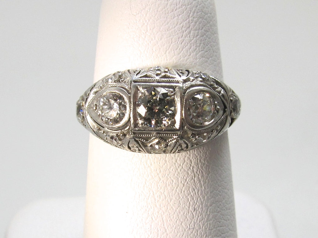 Antique platinum filigree diamond dome ring