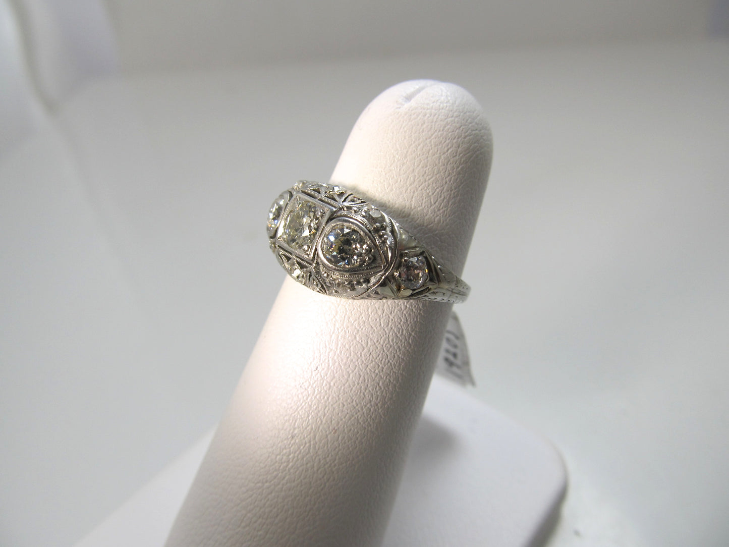Antique platinum filigree diamond dome ring
