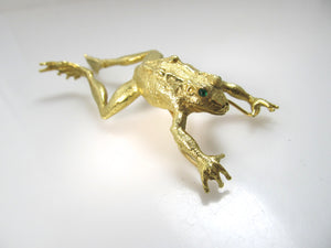 Signed AH 18k yellow gold leaping frog pendant, emerald eyes