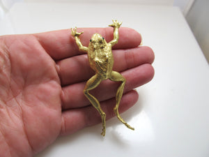 Signed AH 18k yellow gold leaping frog pendant, emerald eyes