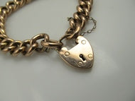 15k rose gold curb chain bracelet with a heart padlock clasp, 1906.
