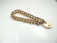 15k rose gold curb chain bracelet with a heart padlock clasp, 1906.