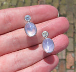 Platinum Earrings With 2 Star Sapphires Totaling 12.00cts, 2 Diamonds Totaling .70cts.