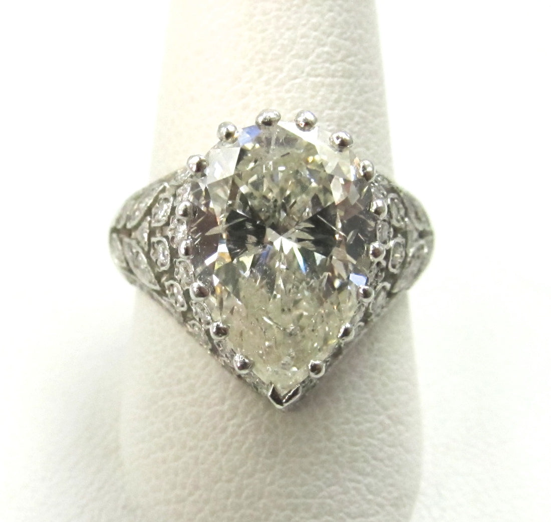 Platinum Filigree Ring With A 4.10ct Pear Shaped Diamond