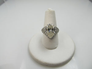 Platinum Filigree Ring With A 4.10ct Pear Shaped Diamond