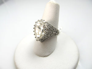 Platinum Filigree Ring With A 4.10ct Pear Shaped Diamond