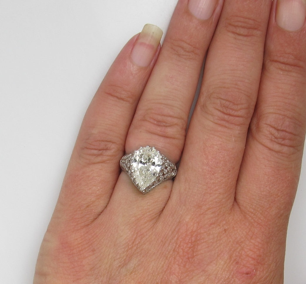 Platinum Filigree Ring With A 4.10ct Pear Shaped Diamond