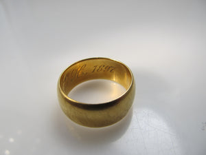 Really neat 18k wedding band dated 1897