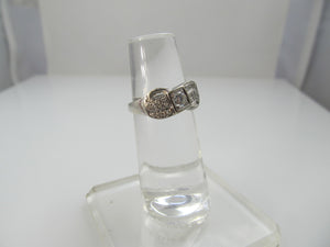 14k white gold ring with a .35ct center diamond, dated 1966