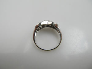 14k white gold ring with a .35ct center diamond, dated 1966