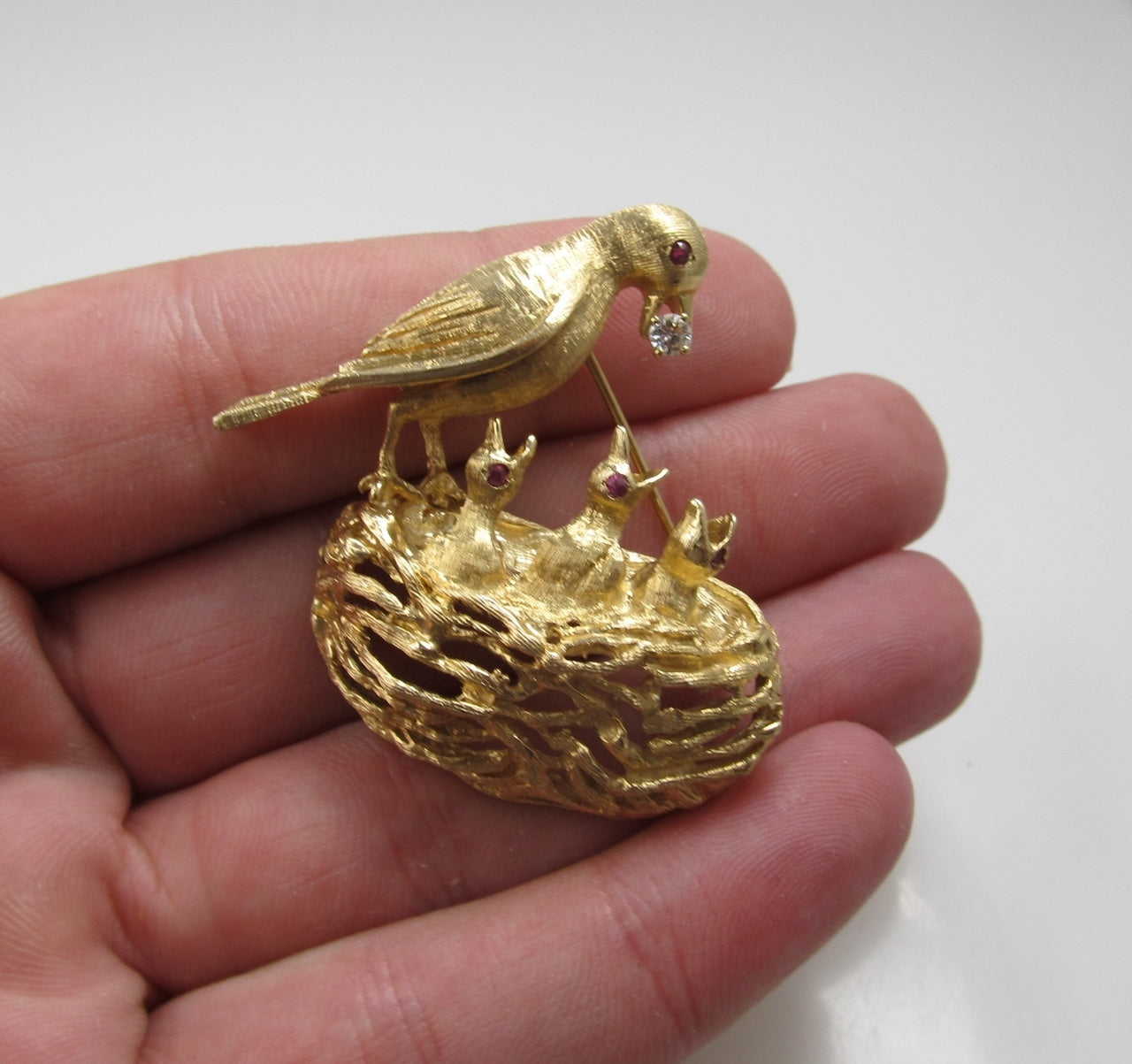 14k yellow gold bird and nest pin with rubies and a diamond, circa 1960