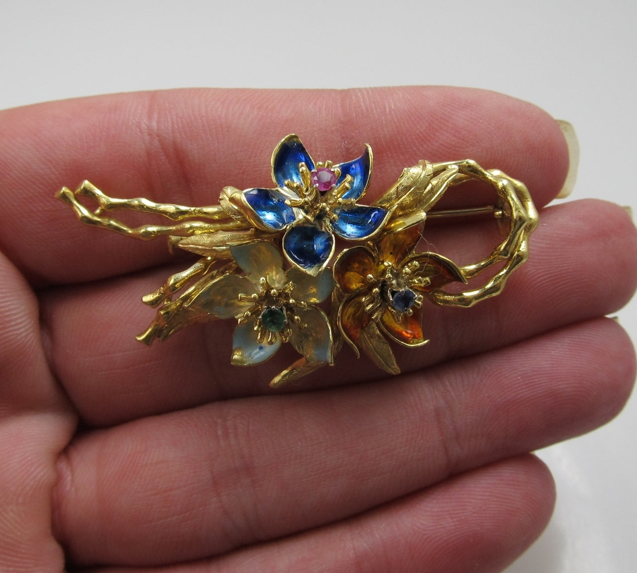 Vintage 18k Gold Enamel Flower Pin With A Ruby, Sapphire And Emerald.