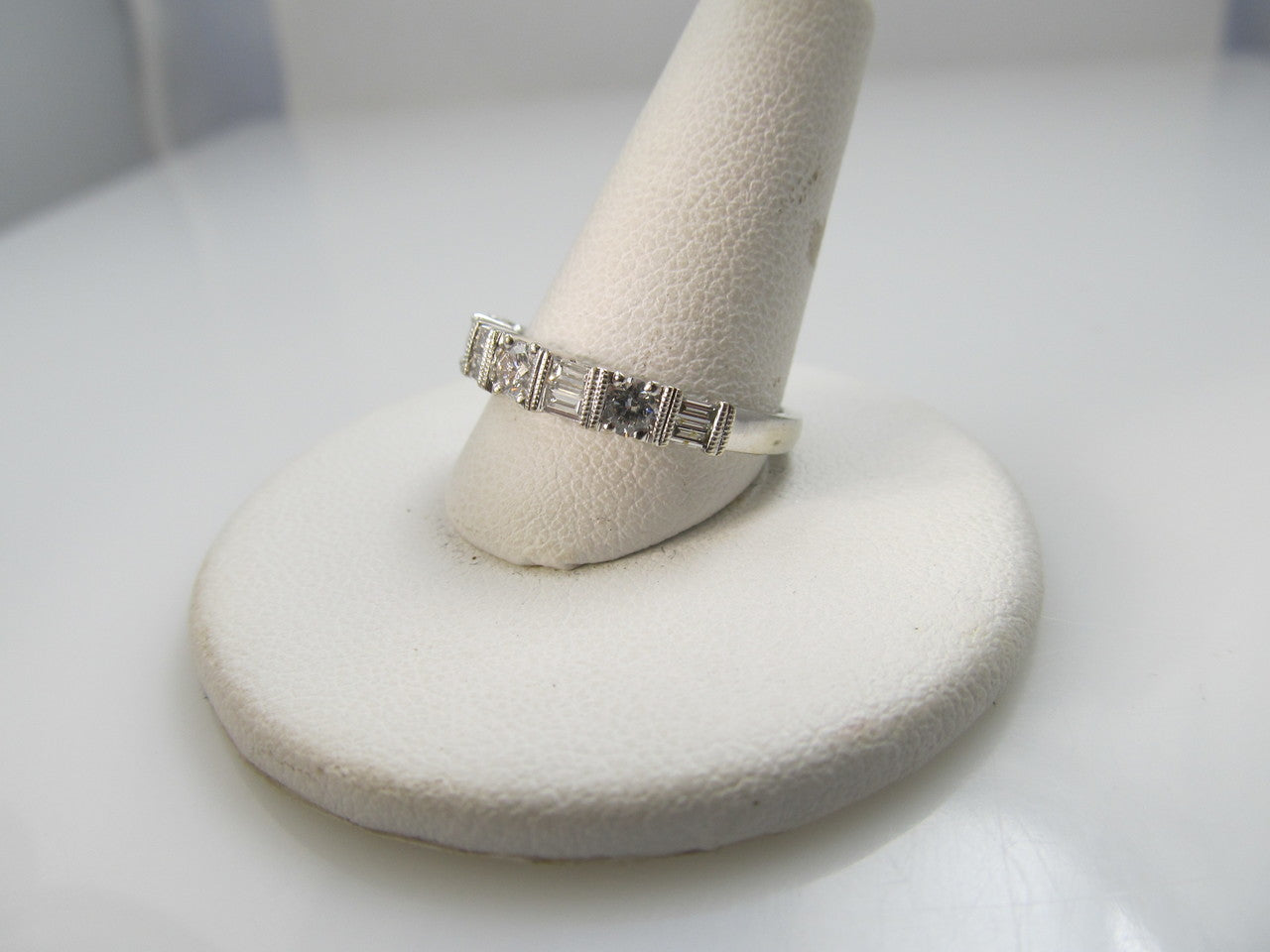14k White Gold Band With .70cts In Round And Baguette Cut Diamonds