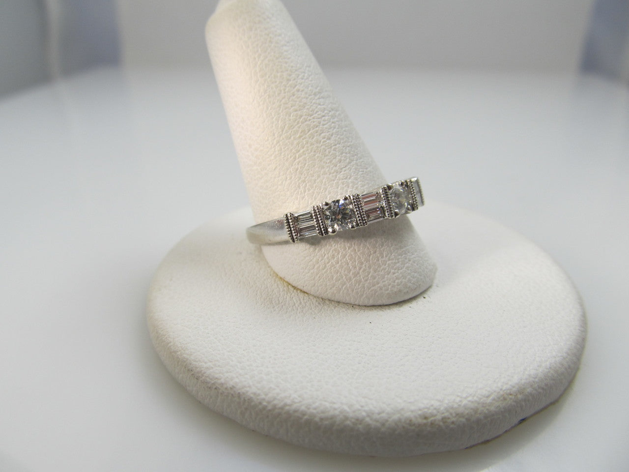 14k White Gold Band With .70cts In Round And Baguette Cut Diamonds