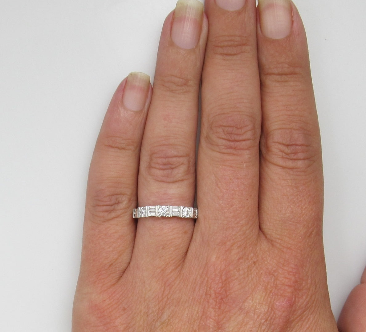 14k White Gold Band With .70cts In Round And Baguette Cut Diamonds
