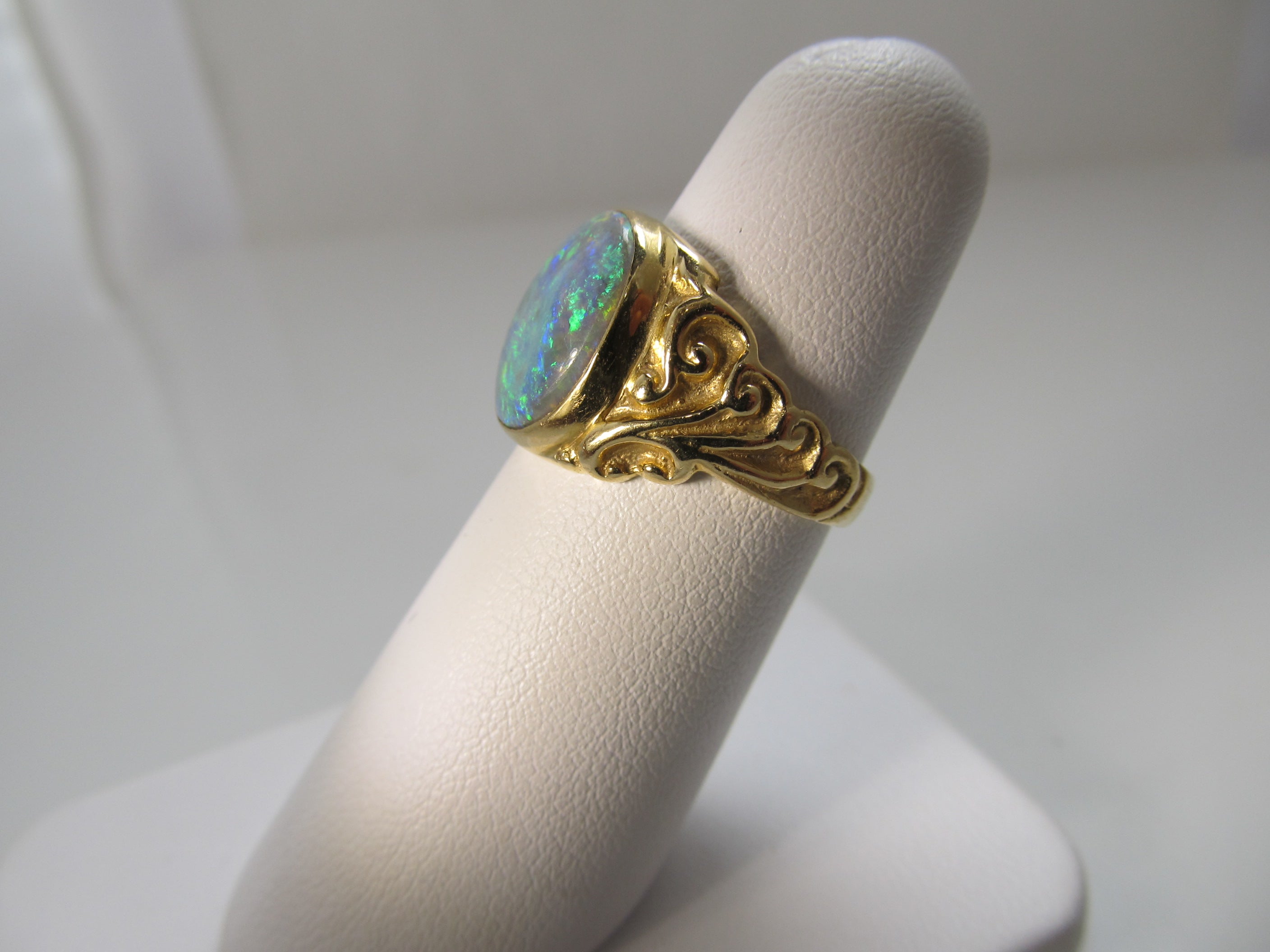Antique 18k yellow gold black opal ring
