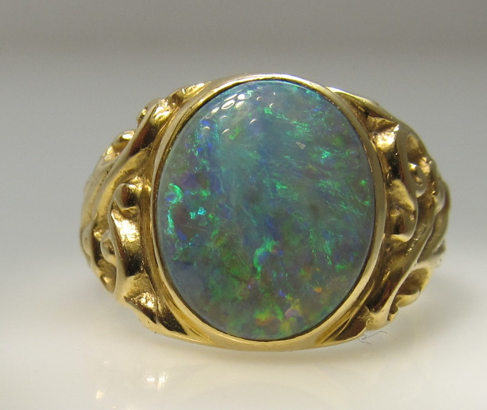 Antique 18k yellow gold black opal ring