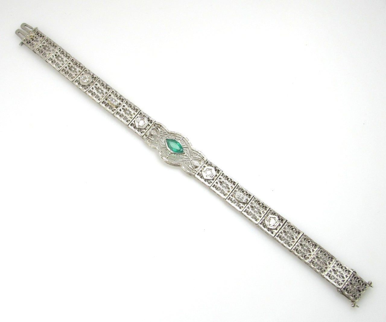 Platinum And 14k Filigree Bracelet With A .80ct Emerald And .70cts In Diamonds, Circa 1920