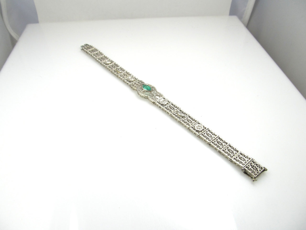 Platinum And 14k Filigree Bracelet With A .80ct Emerald And .70cts In Diamonds, Circa 1920