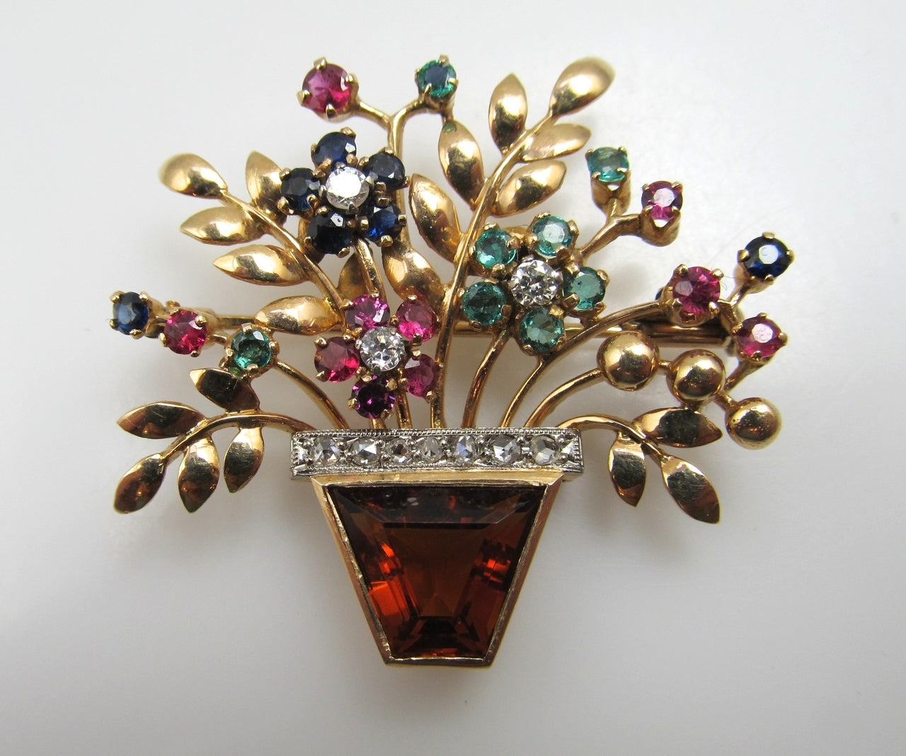 14k Rose Gold Flower Basket Pin With A Citrine, Diamonds, Emeralds, Rubies And Sapphires, Circa 1940