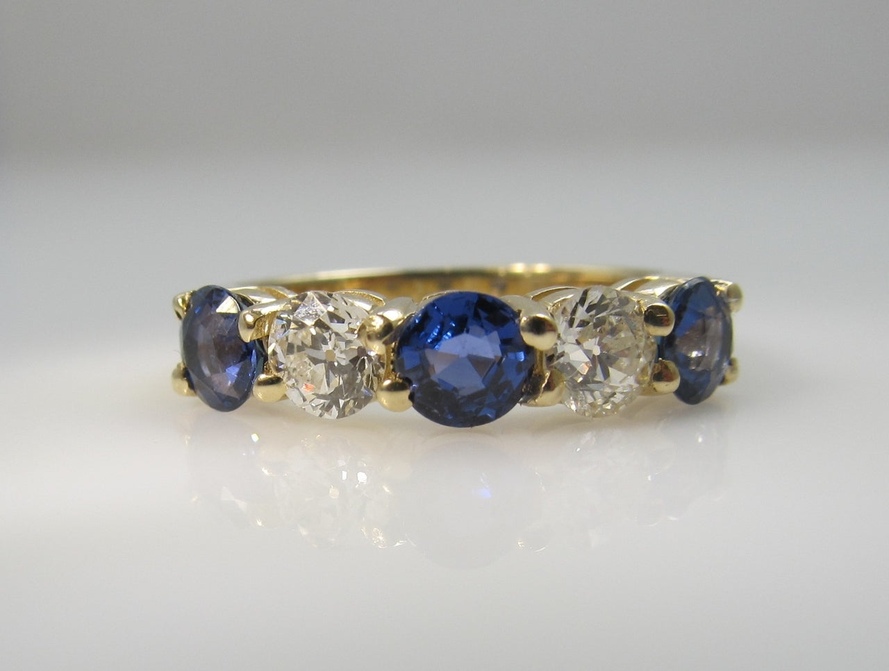 14k Gold Band With .80cts In Diamonds And 1.50cts In Sapphires