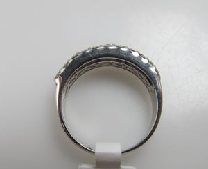 18k white gold band with 1.20cts in round and baguette cut diamonds