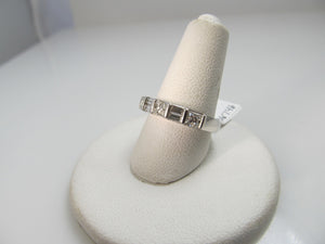 14k White Gold Band With .80cts In Baguette And Princess Cut Diamonds