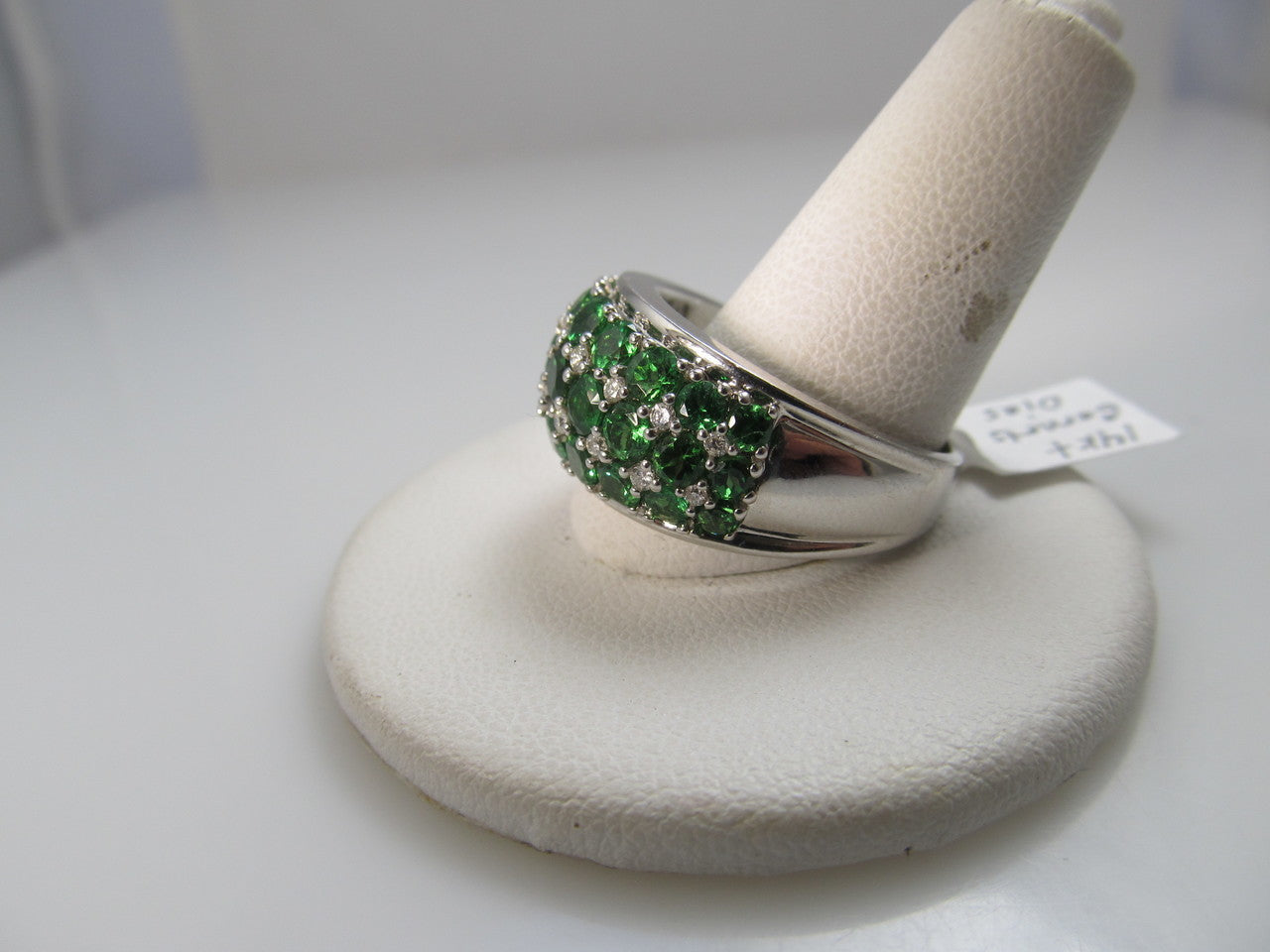 14k white gold ring with diamonds and tsavorite garnets