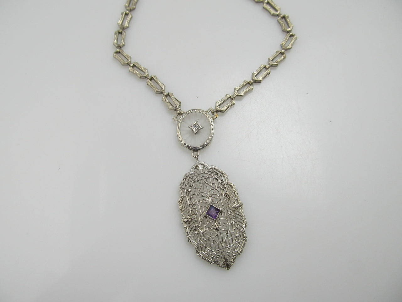 14k White Gold Filigree Camphor Glass Necklace With Amethyst And Diamond, Circa 1920