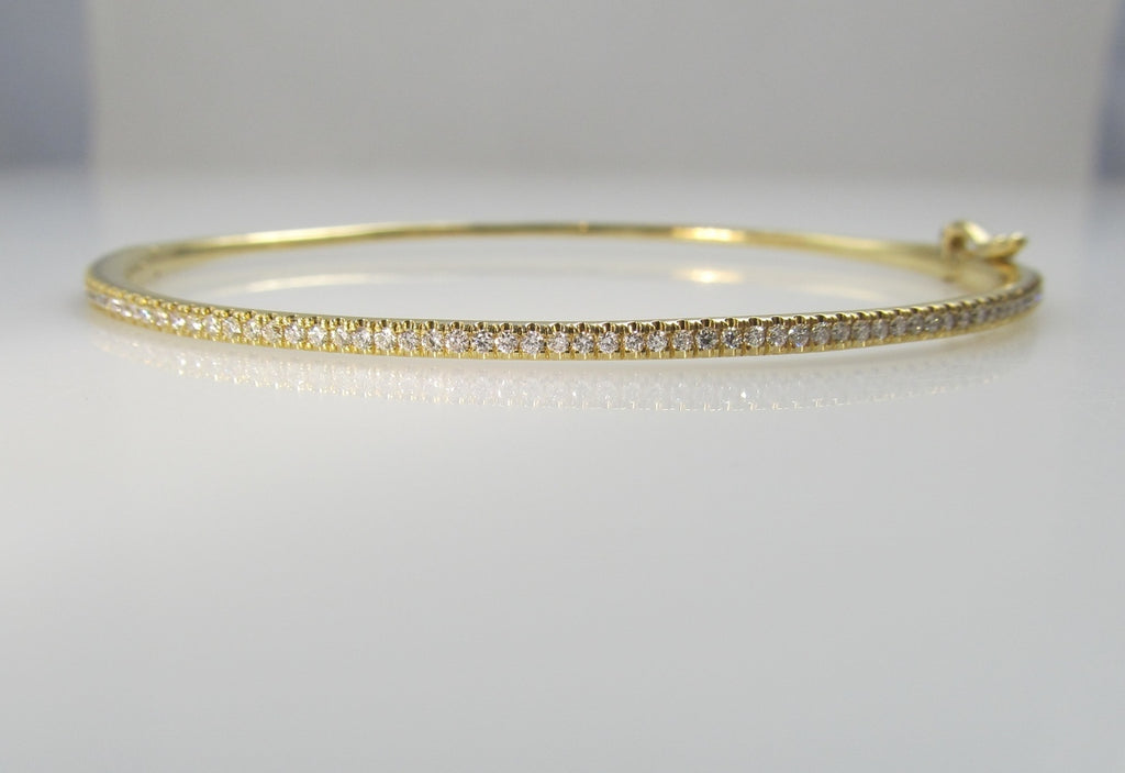 18k yellow gold bangle bracelet with .52cts in diamonds signed Bony Levy