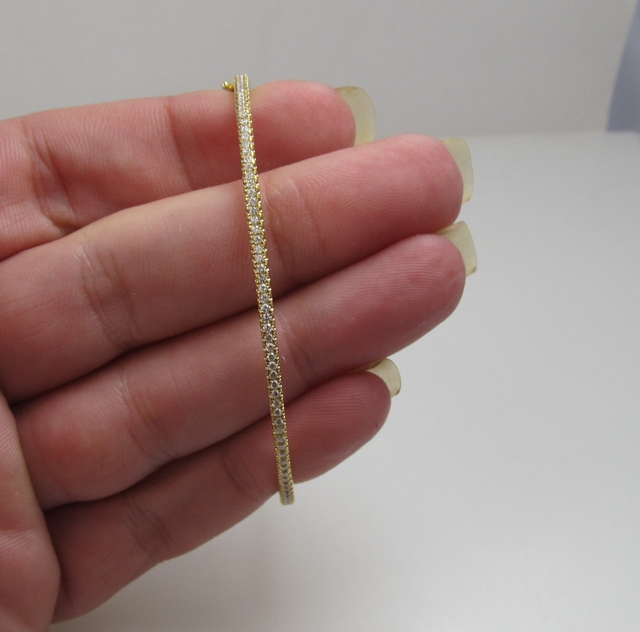 18k yellow gold bangle bracelet with .52cts in diamonds signed Bony Levy